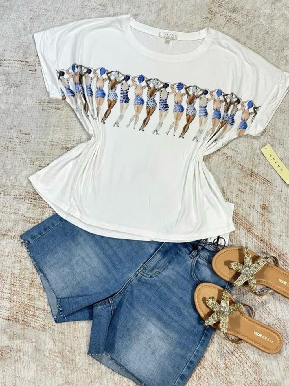 New  Cyrus White Tee with Row of Blue Swimsuit Figures